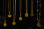 Several gold necklaces with initial pendants displayed.