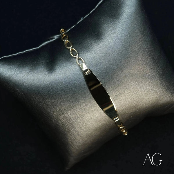 Luxurious 18k gold ID bracelet for kids with oval chain and engravable plate