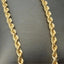 Lustrous 18k gold rope chain showcasing timeless elegance in art gold jewelry
