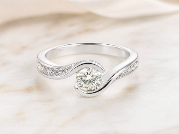 Twist of Light — Bypass Diamond Ring, angled view, 18K white gold
