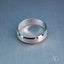 Matte silver beveled 18k white gold wedding band with engraved interior, elegant art gold jewelry