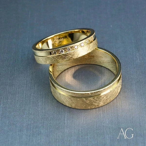 Elegant 18k gold diamond wedding band with brushed finish and small diamonds