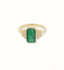 Yellow gold ring with emerald-cut green emerald and diamond accents, a rare emerald encounter art in the Greater Boston area