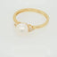 Lustrous 7mm pearl ring with accent diamonds showcasing elegance redefined in Golden Elegance