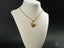 Art gold jewelry golden heart pendant featuring an 18k solid gold chain necklace with heart-shaped locket