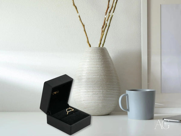 Golden heart ring in 18k gold open-heart design in black velvet box