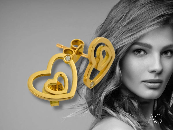 Pair of 18k yellow gold heart diamond earrings with small diamonds
