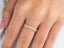 Elegant 18k yellow gold ring with alternating gold cz heart motifs and diamond accents