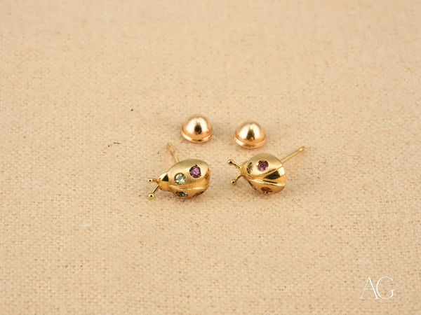 Pair of certified 18k solid gold ladybug earrings with colorful CZ accents