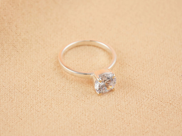 Silver Lumina Promise Solitaire engagement ring with round clear gemstone