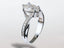 Silver ring with pear radiance lab-grown diamond and pavé-set side stones in white gold