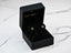 Radiant Love 18k gold heart drop earrings in black jewelry box