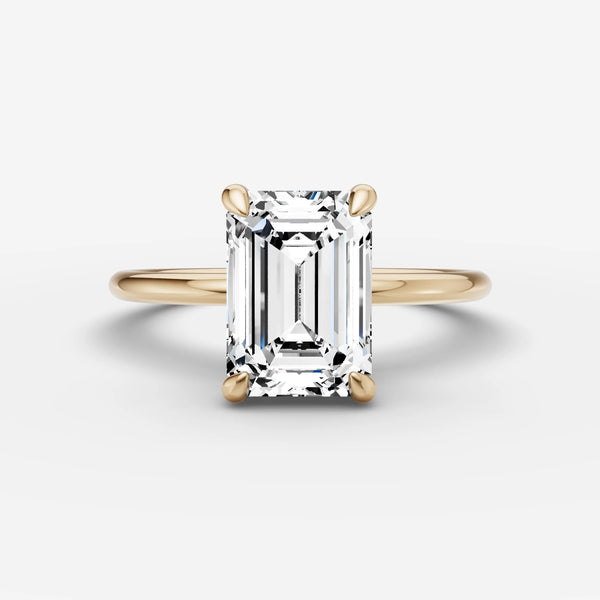 Mystère Emerald Engagement Ring in Gold front view