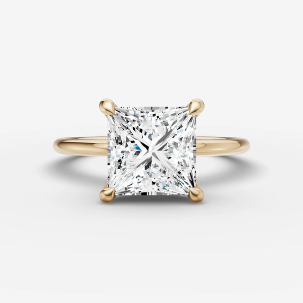 Front view of Solène Princess solitaire ring setting with princess-cut center and diamond-accented band