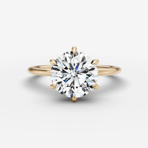 Solène Round solitaire ring setting, diamond-accented band, angled profile view