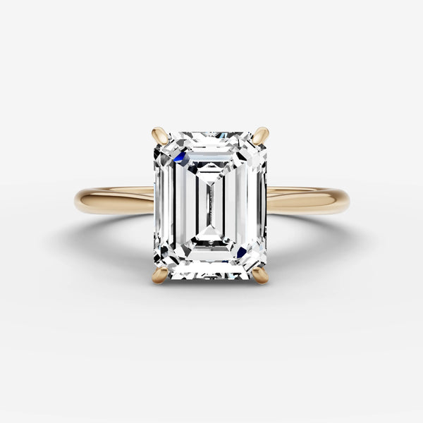 Cathedral engagement ring setting in yellow gold with rectangular center stone, front view
