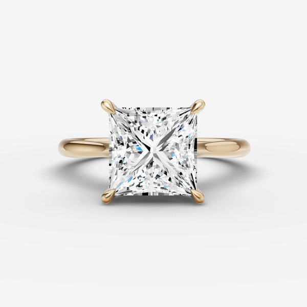 Top-down view of princess cut solitaire ring setting with four prongs