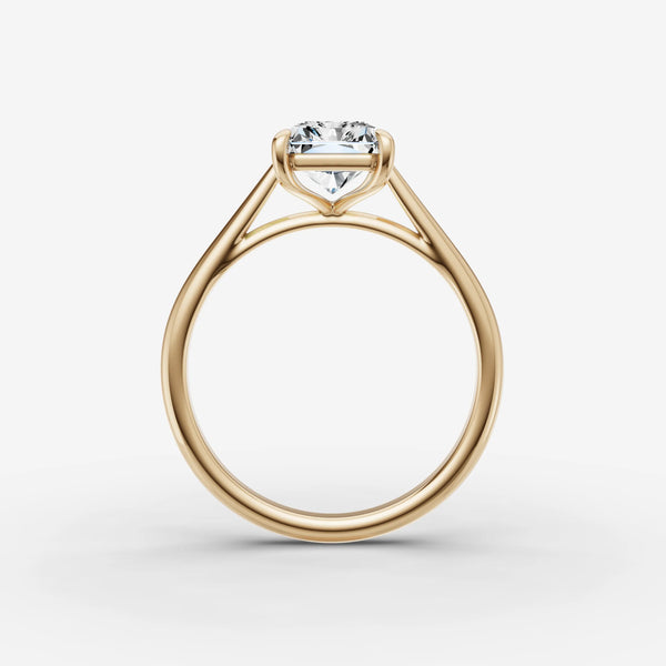 Cathedral engagement ring setting in yellow gold, side view with arched shoulders