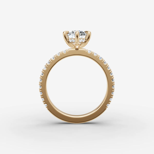 Side view of yellow gold ring setting showing hidden halo under marquise center mount and pave band