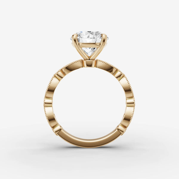 Side view of Heritage Round ring setting in yellow gold showing elevated setting and band profile