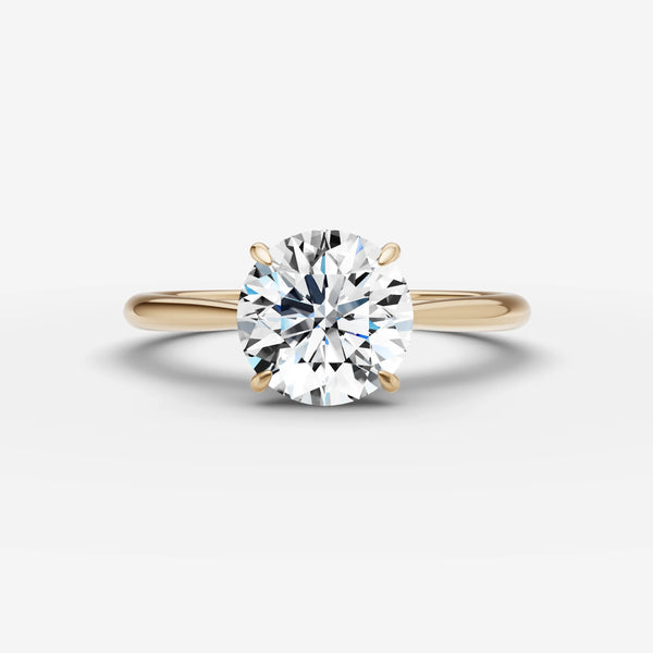 Cathedral engagement ring setting in yellow gold with round center stone, front view