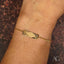 Gold ID bracelet for kids featuring a customizable 18k solid gold engraved ID plate
