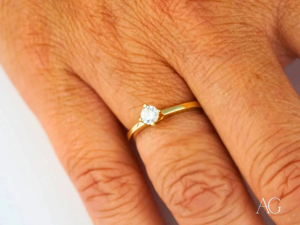 Timeless 18k yellow gold CZ solitaire ring with clear gemstone