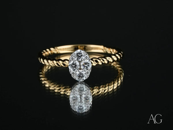Twist of Brilliance Engagement Ring with twisted band and oval diamond focal point