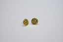 Gold-colored coin-shaped stud earrings with intricate engraved designs showcasing fine jewelry and art gold craftsmanship