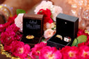 Gold heart-shaped 18k engagement ring in brown box
