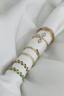 Elegant 18k gold jewelry rings with diamonds, sapphires, emeralds