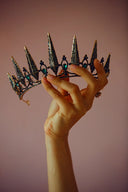 Black and gold spiked tiara with blue gemstones in 18k art gold jewelry