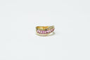 Elegant 18k gold ring with pink sapphire and diamond accents
