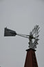 a street sign on top of a building