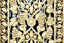 a close up of a decorative iron gate
