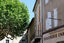 a building with a tree in front of it