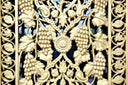 a close up of a decorative iron gate