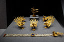 Gold jewelry golden peacock headdress with pearls and a blue gemstone featured in fine art gold jewelry heirlooms