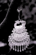 silver and diamond studded heart pendant