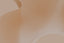 a blurry image of a light brown background