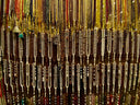 a display of beads and necklaces in a store