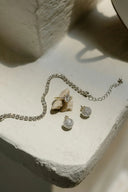 Silver diamond-studded fine jewelry bracelet with delicate chain and sparkling cubic zirconia in birthstone inspirations