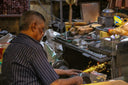 A man working on a machine in a shop