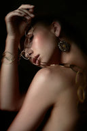 A delicate gold jewelry chain necklace with interlocking oval links worn elegantly from everett fine jewelry store