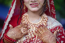 Cleopatra’s royal jewels: bride in red gold art jewelry with embroidery