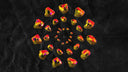 Vibrant yellow and red geometrically faceted gemstones arranged radially illustrating natural diamonds and lab grown value differences