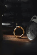 a close up of a ring on a table