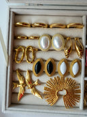 Gold-toned vintage earrings with pearl and black stone accents showcasing fine jewelry and art gold craftsmanship