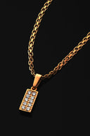 Gold-toned rectangular pendant necklace with clear stones on an 18k gold chain showcasing fine jewelry style