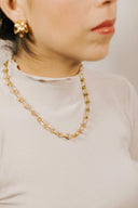 18k art gold jewelry: gold-toned chain necklace with oval and star charms
